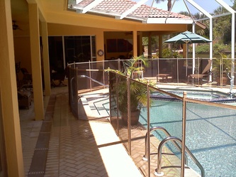 pool fence mounted in Pavers